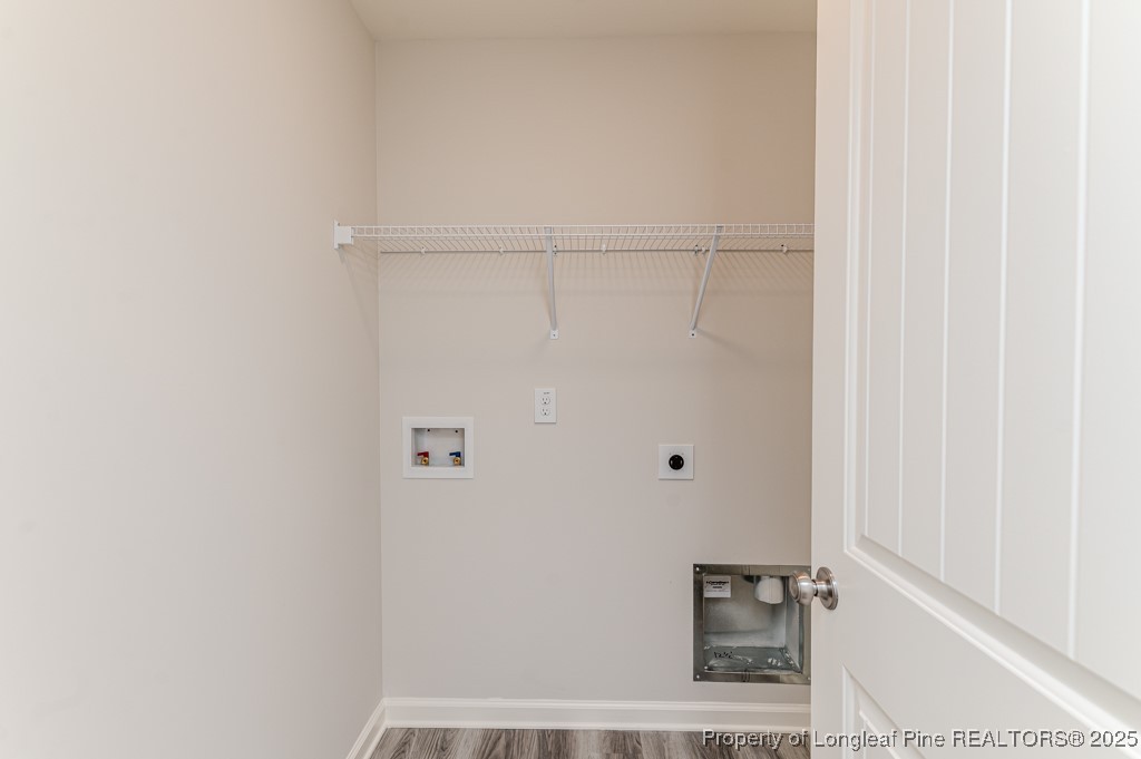 87 Onslow Court Spring Lake, NC 28390 - Photo 24 of 33 a view of small space with racks on the wall