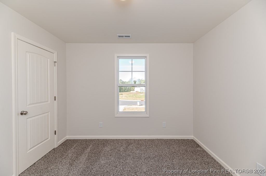 87 Onslow Court Spring Lake, NC 28390 - Photo 25 of 33 an empty room with window