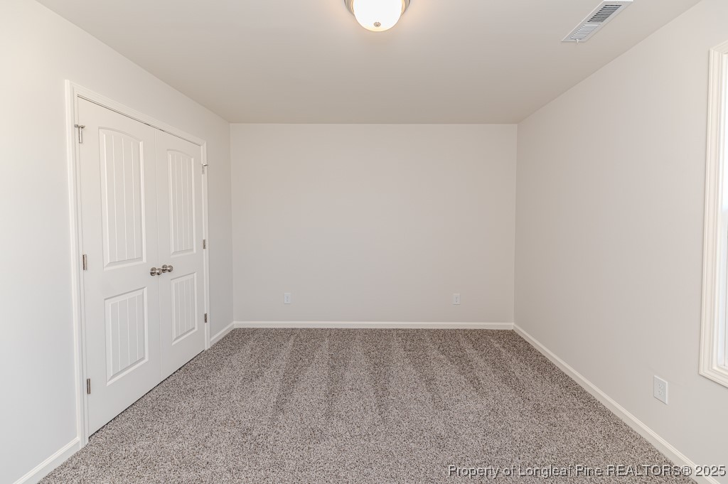 87 Onslow Court Spring Lake, NC 28390 - Photo 28 of 33 a view of an empty room