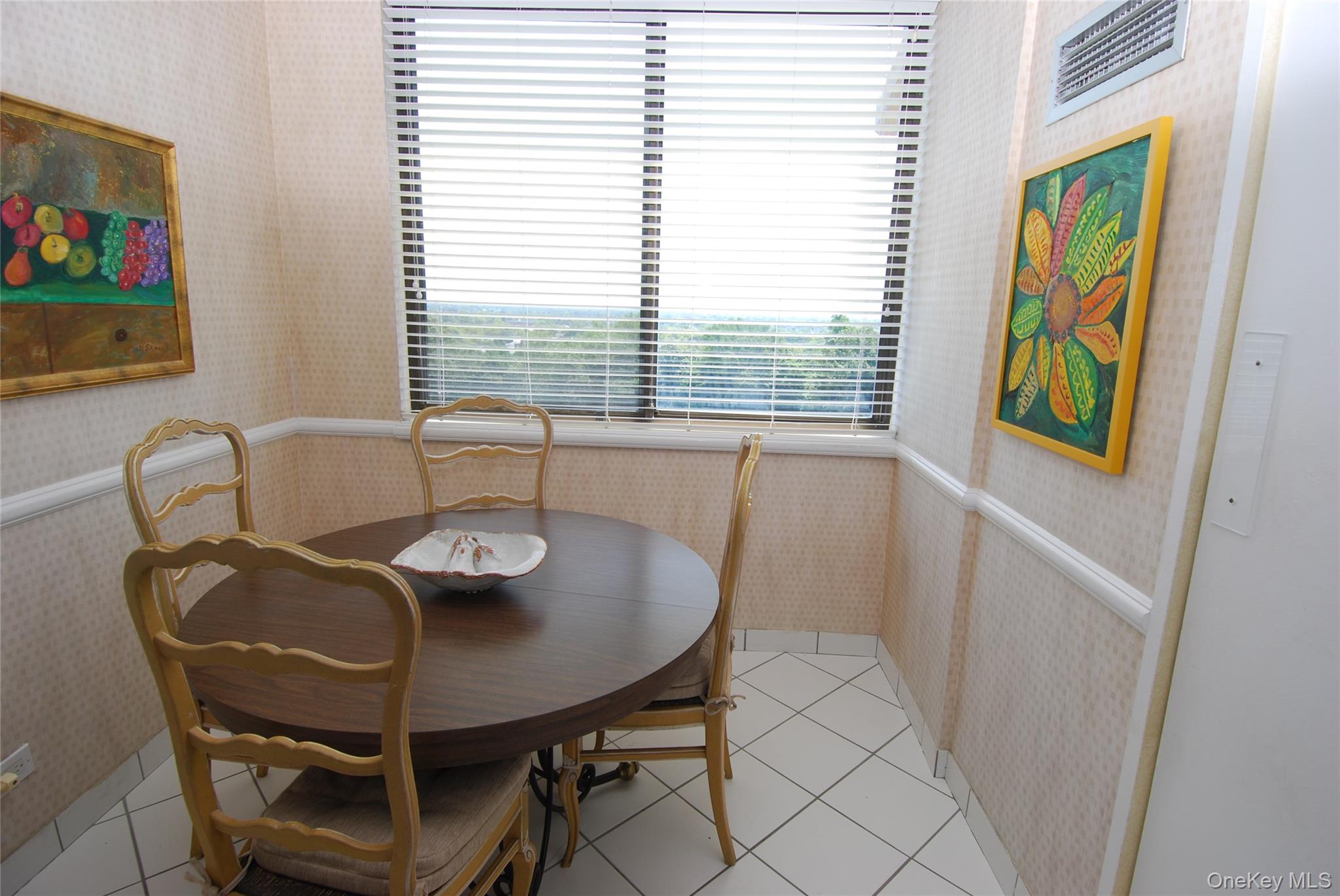 269 Grand Central Parkway, Unit 5V Queens, NY 11005 - Photo 14 of 19 a view of a dining room with furniture and a window
