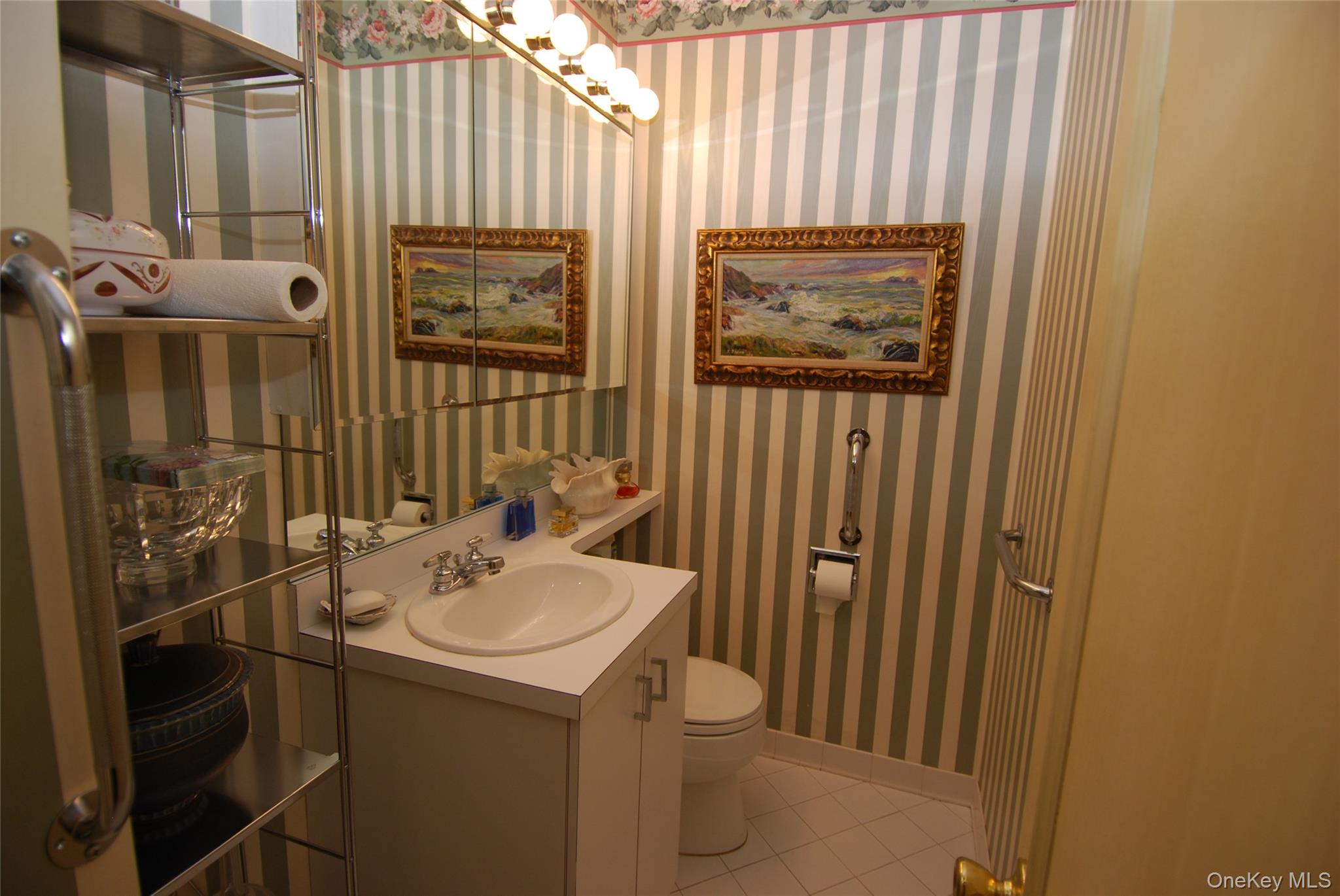 269 Grand Central Parkway, Unit 5V Queens, NY 11005 - Photo 15 of 19 a bathroom with a sink and a mirror