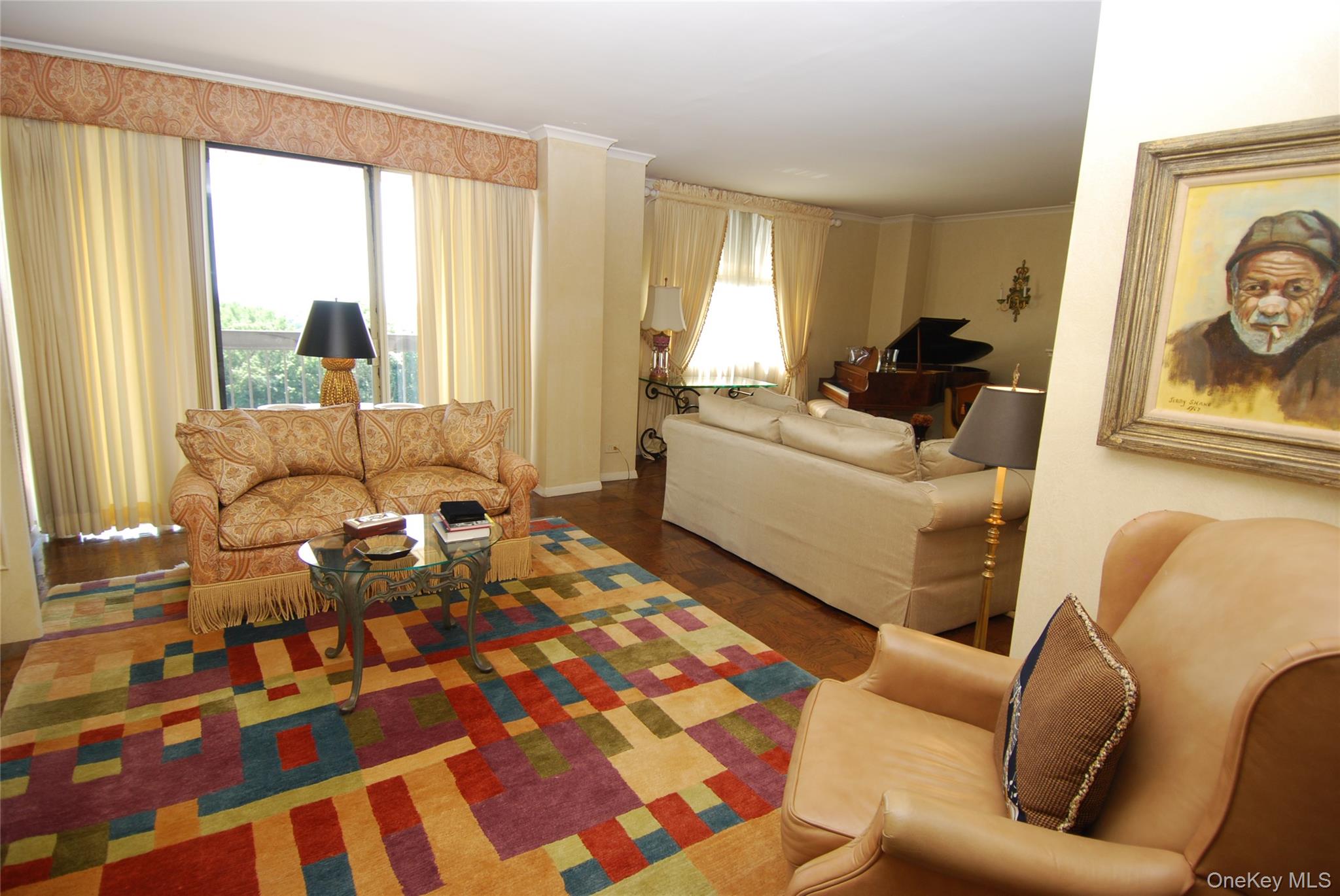 269 Grand Central Parkway, Unit 5V Queens, NY 11005 - Photo 4 of 19 a living room with furniture and a large window