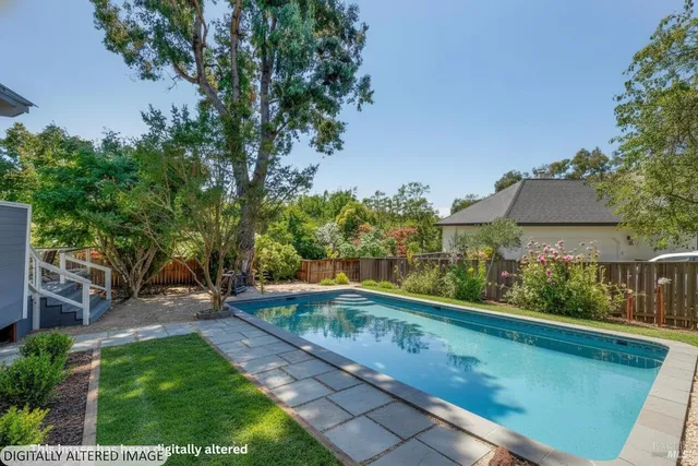 a view of a backyard with a garden