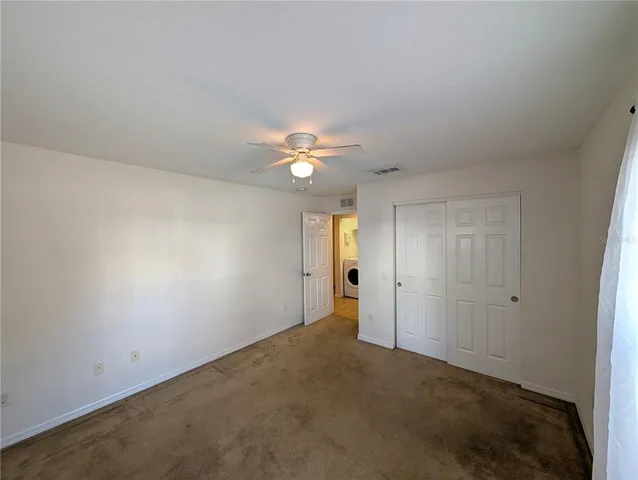 an empty room with a bathroom