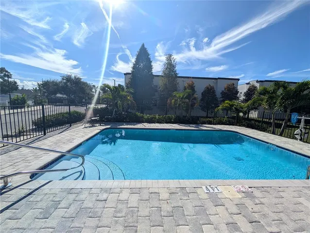 a view of swimming pool outdoor seating