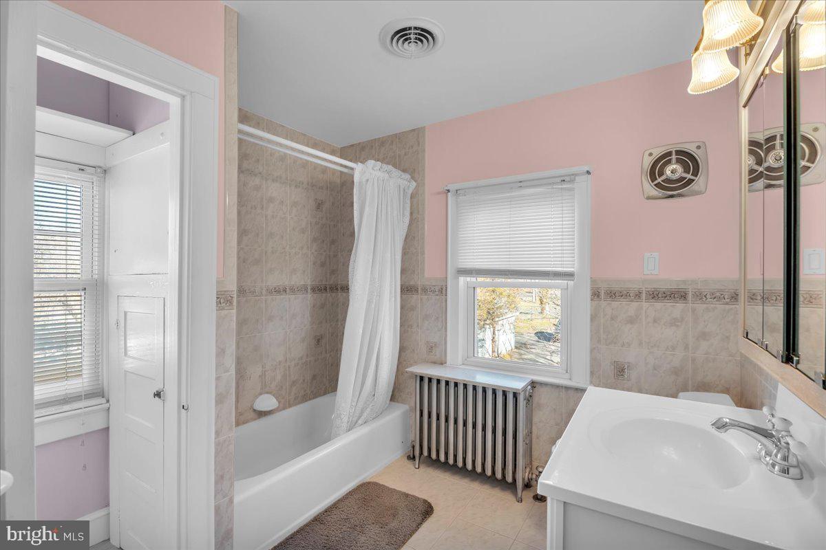 83 South Rte 73 Sicklerville, NJ 08081 - Photo 16 of 24 a bathroom with a bathtub and a shower