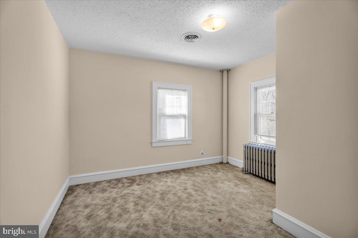 83 South Rte 73 Sicklerville, NJ 08081 - Photo 17 of 24 an empty room with windows