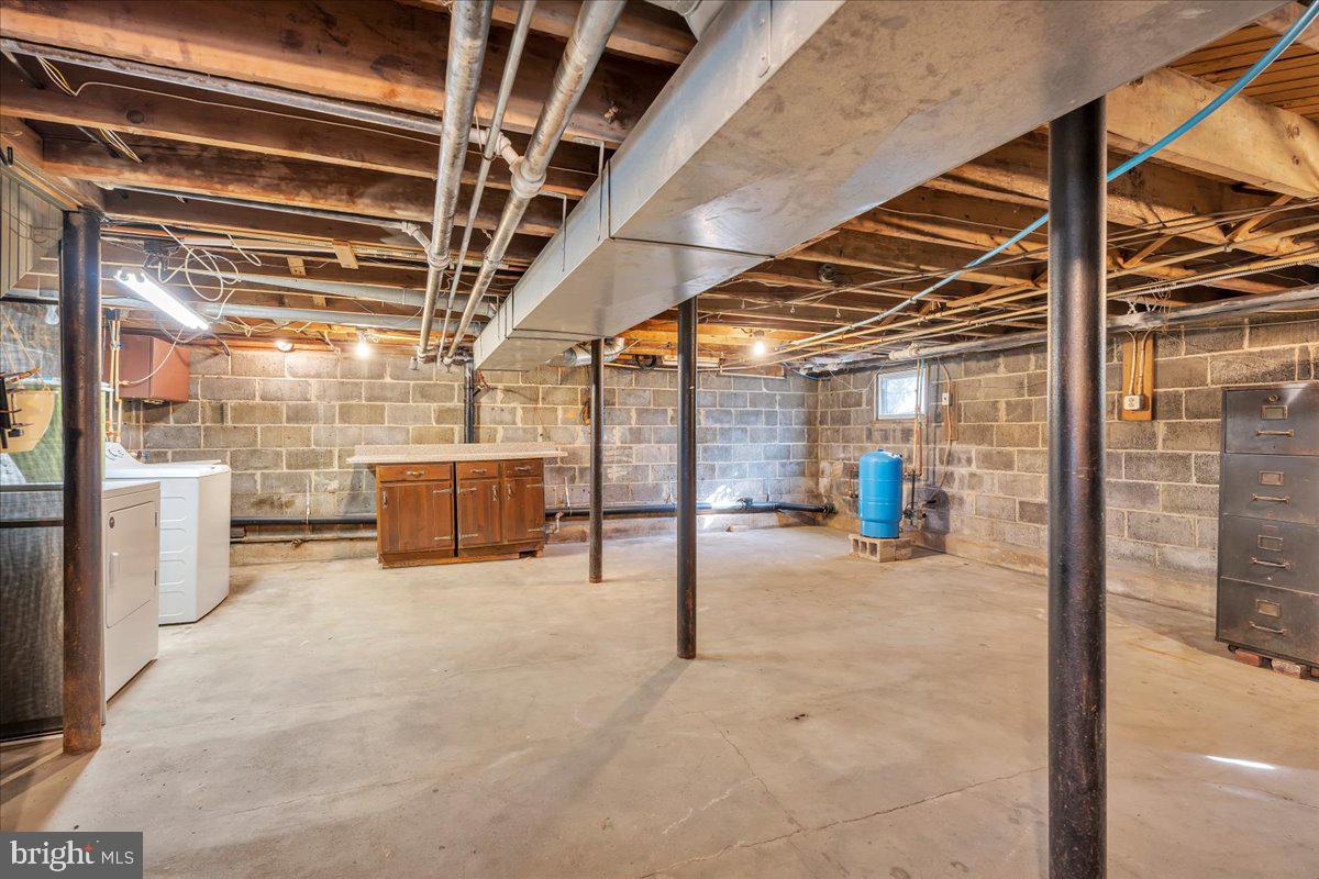 83 South Rte 73 Sicklerville, NJ 08081 - Photo 19 of 24 a view of a room with racks on the wall