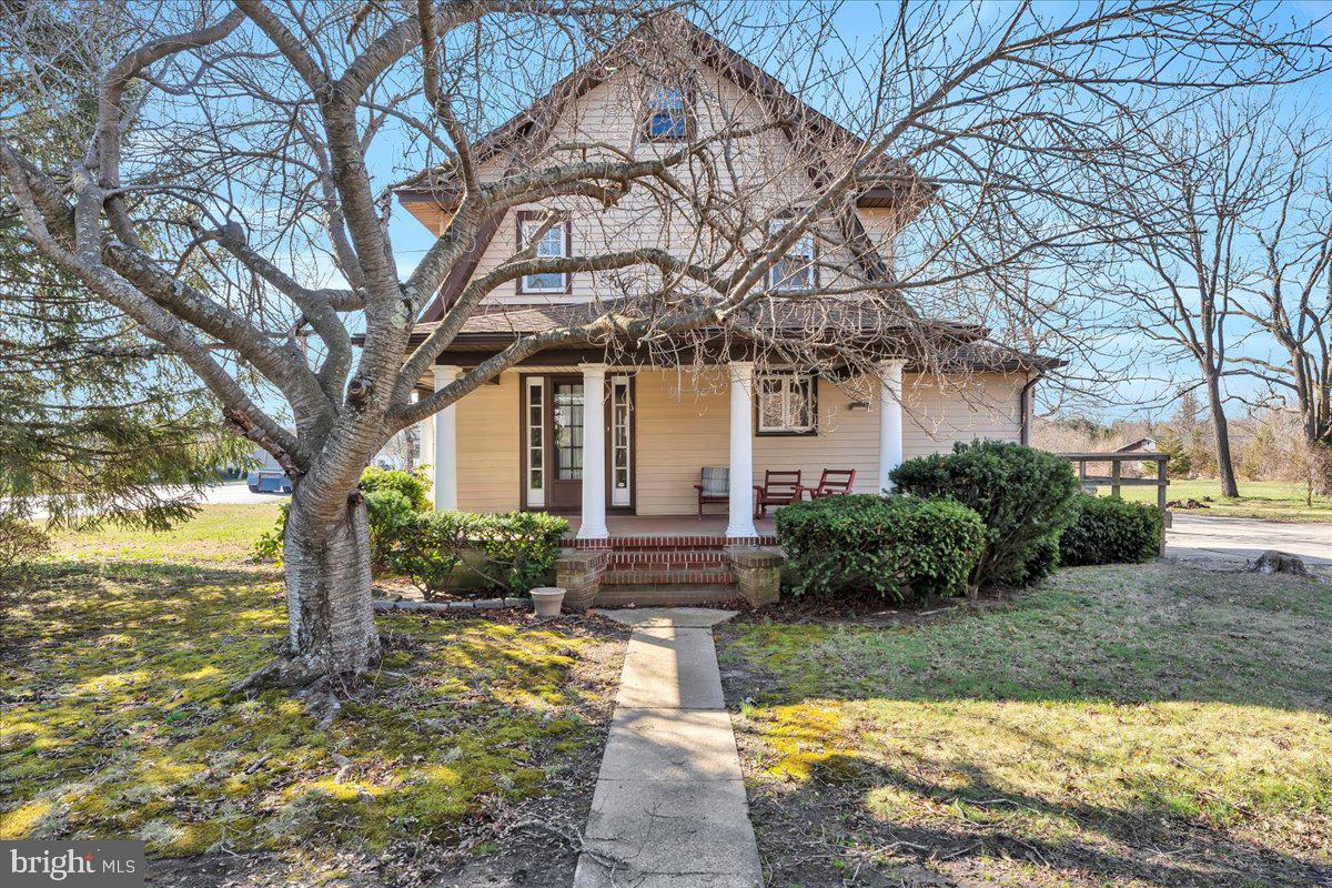 83 South Rte 73 Sicklerville, NJ 08081 - Photo 20 of 24 a front view of a house with garden