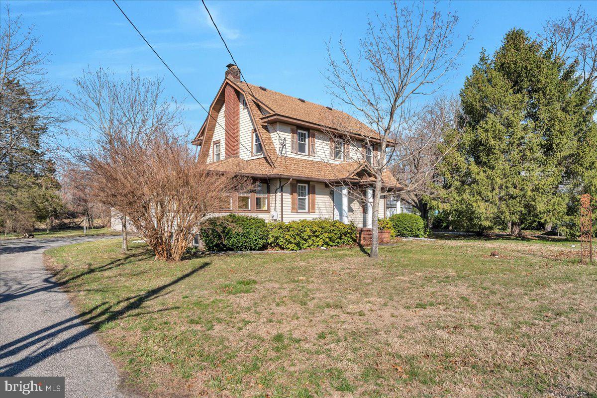 83 South Rte 73 Sicklerville, NJ 08081 - Photo 2 of 24 a view of a yard in front of a house