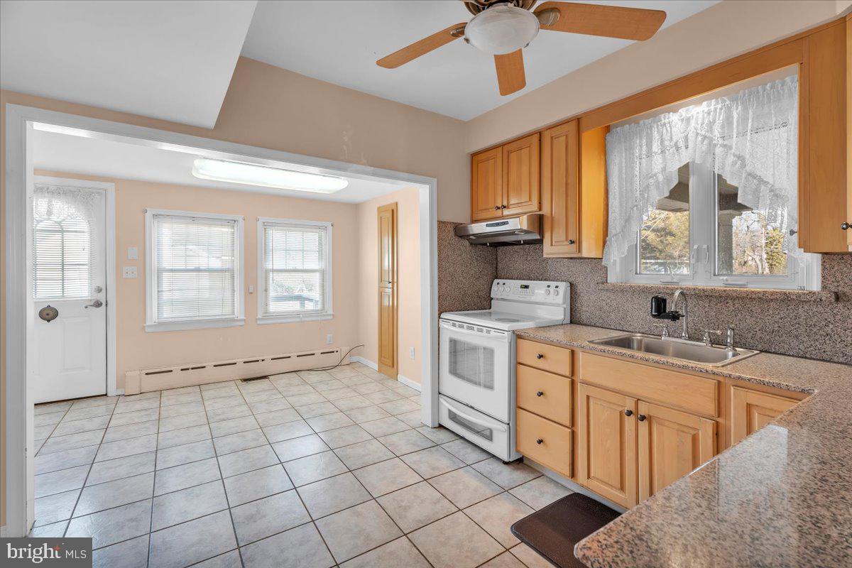 83 South Rte 73 Sicklerville, NJ 08081 - Photo 10 of 24 a view of a kitchen with electric appliances