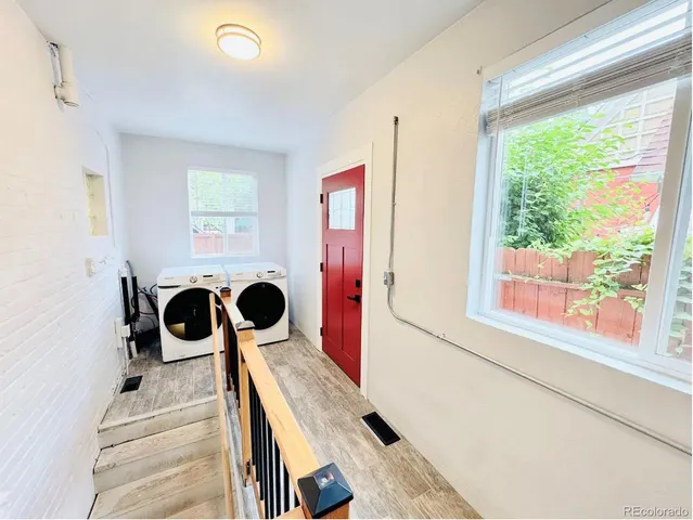 a view of front door and bedroom
