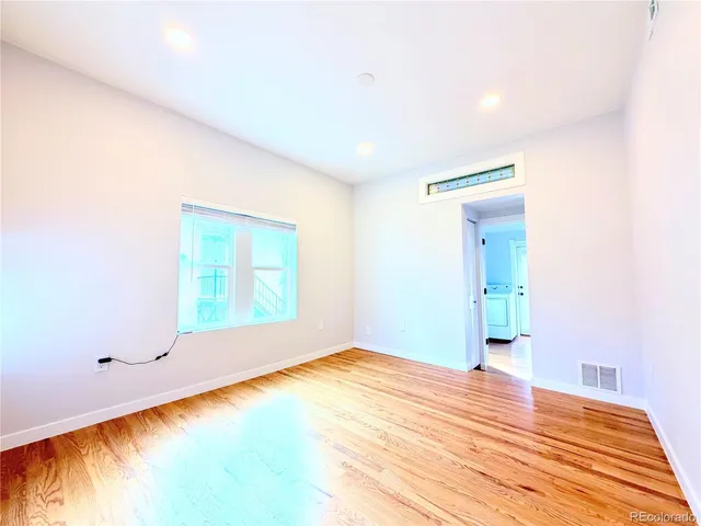 a room with a sink and dishwasher