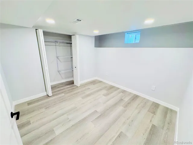 a bathroom with a sink a shower and a mirror
