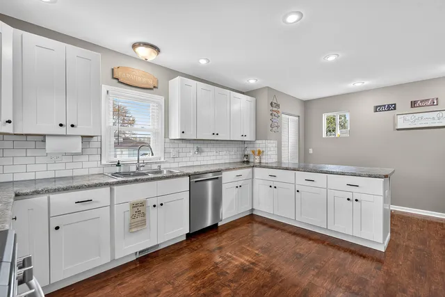 a large kitchen with cabinets