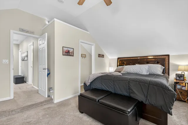 a bedroom with a bed and a cabinets