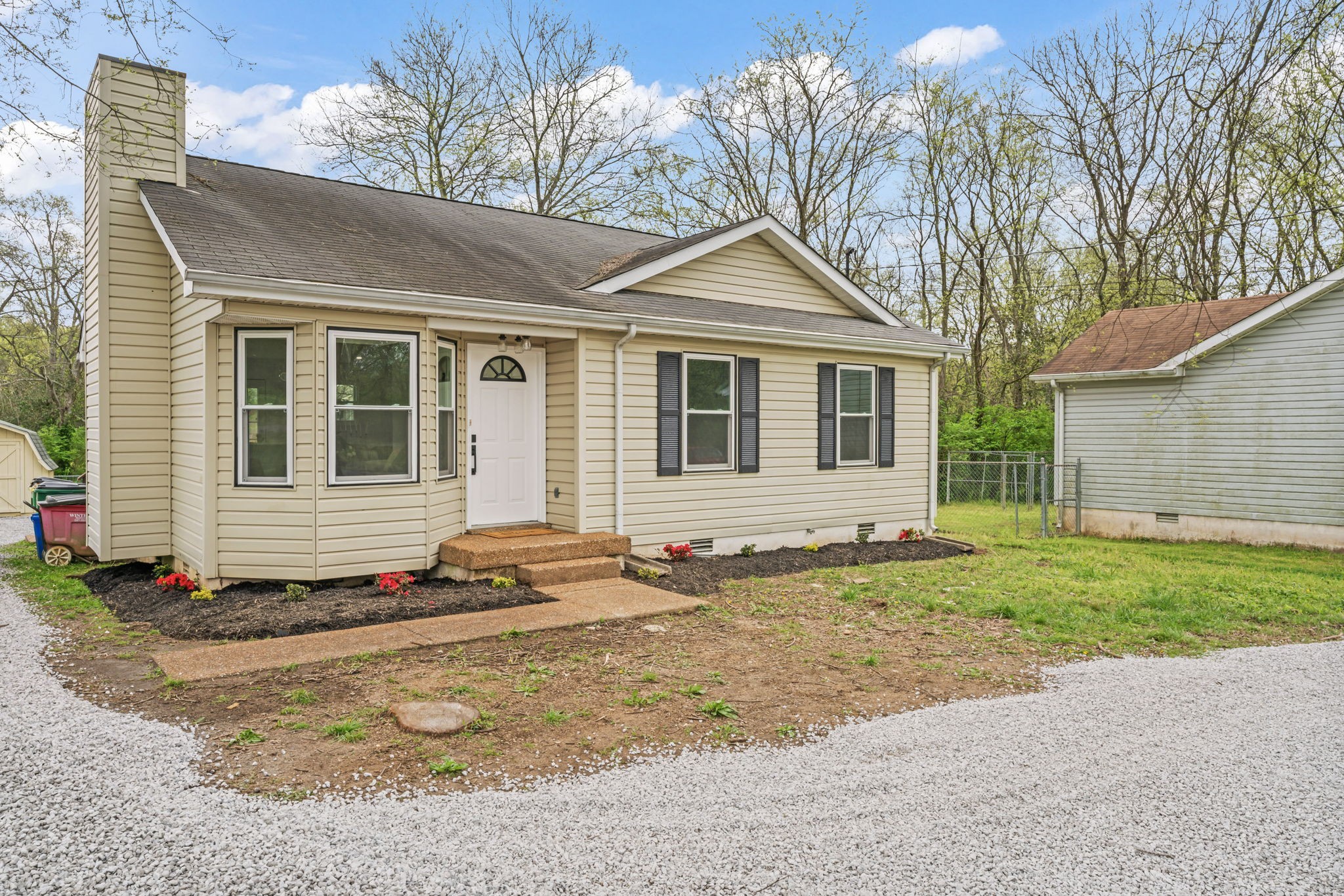 841 Neelys Bend Road Madison, TN 37115 - Photo 1 of 17 a front view of a house with a yard