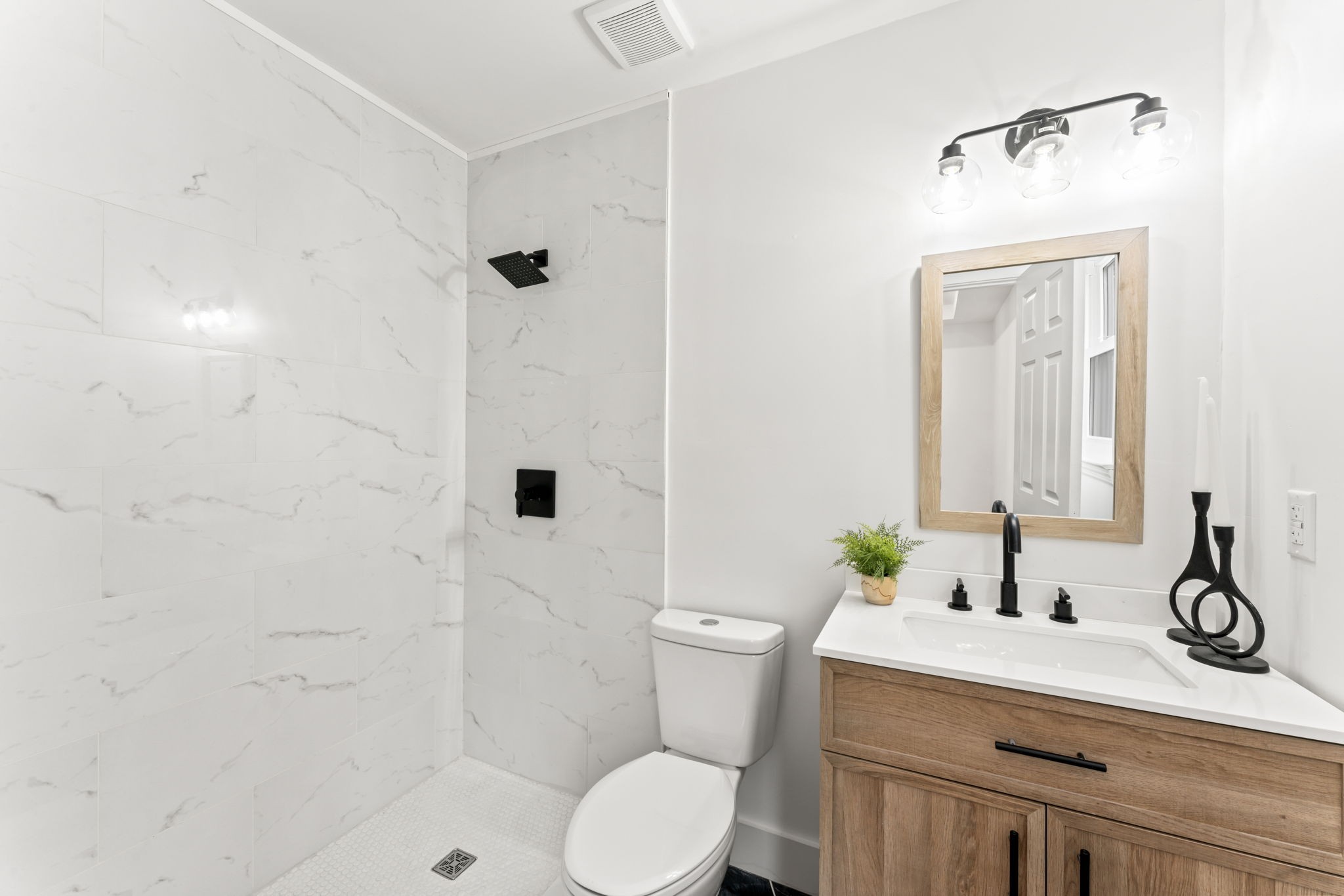 841 Neelys Bend Road Madison, TN 37115 - Photo 16 of 17 a bathroom with a sink a toilet and shower