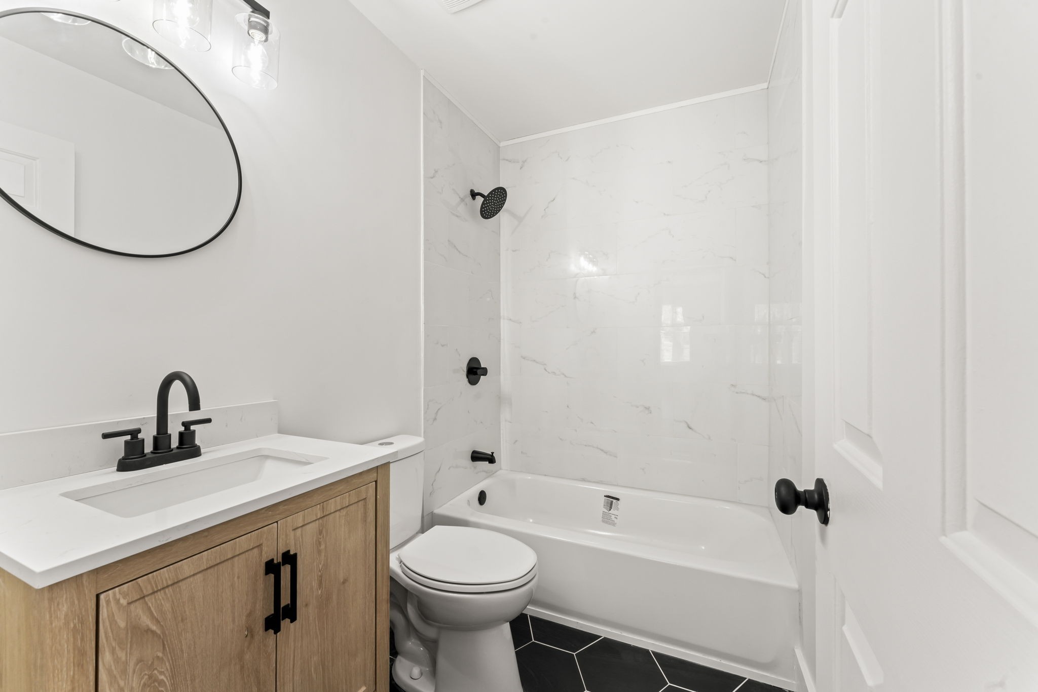 841 Neelys Bend Road Madison, TN 37115 - Photo 9 of 17 a bathroom with a sink and a mirror