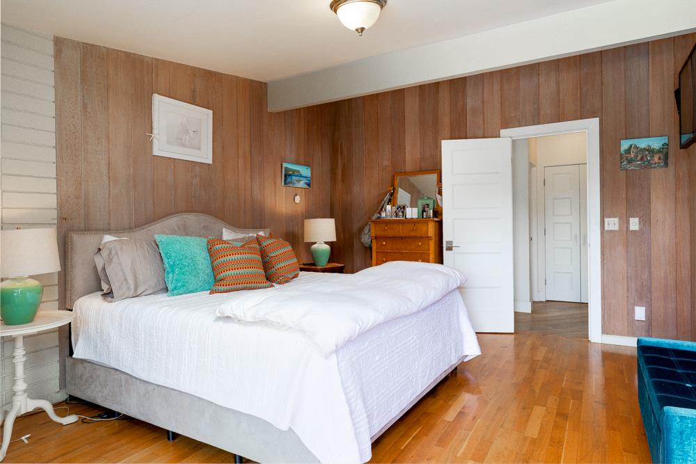 377 Brooktree Ranch Road Aptos, CA 95003 - Photo 21 of 50 a bed room with a bed and a night stand