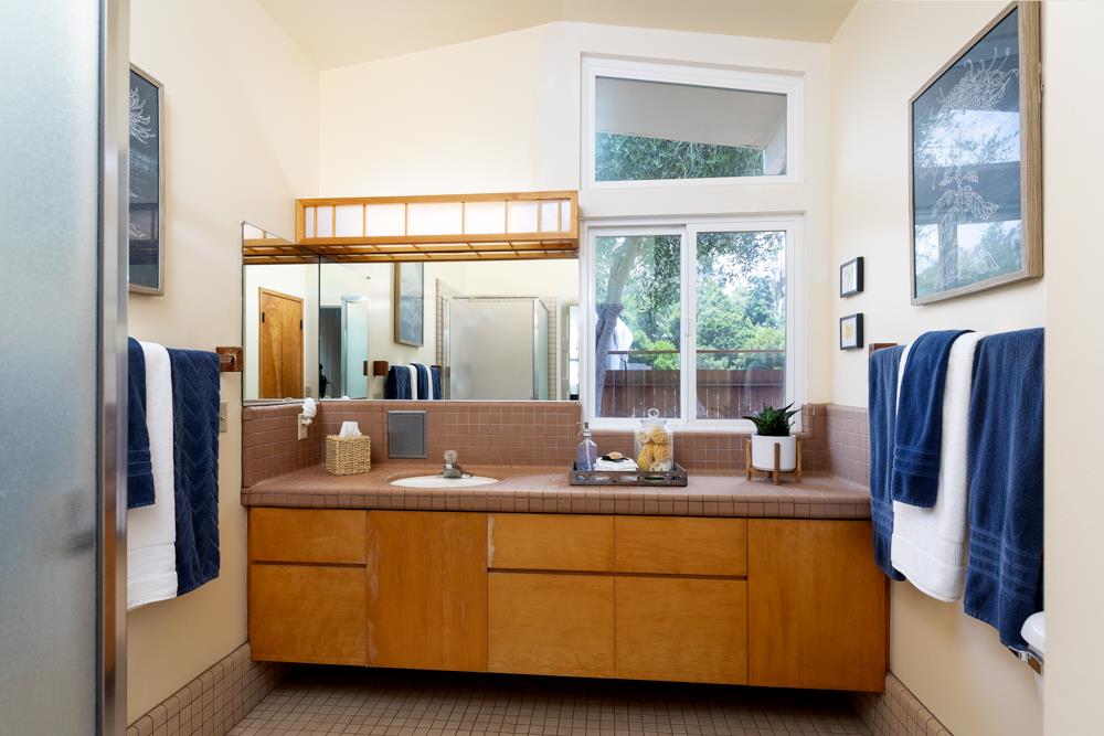 377 Brooktree Ranch Road Aptos, CA 95003 - Photo 24 of 50 a living room with furniture and large windows