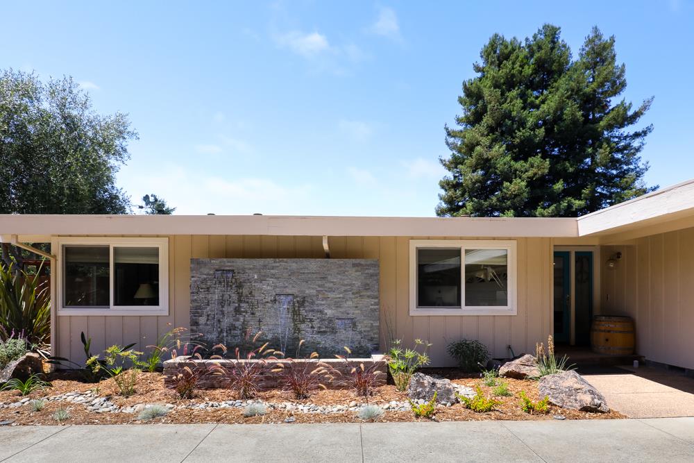 377 Brooktree Ranch Road Aptos, CA 95003 - Photo 8 of 50 a front view of a house with a yard