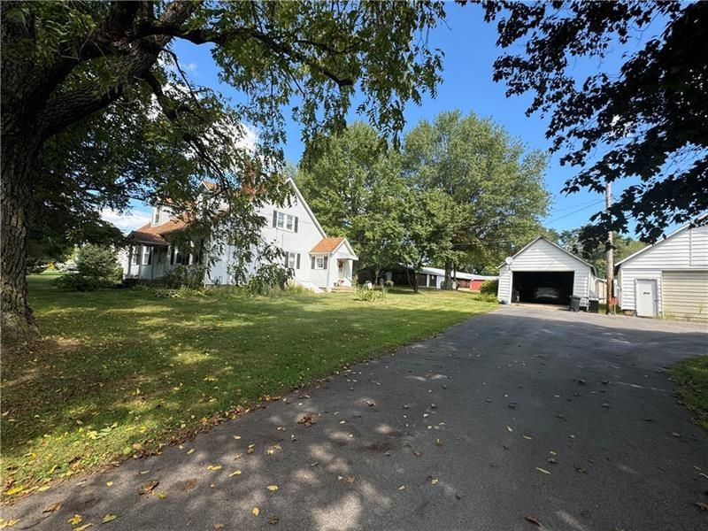 149 South Franklin Street Prospect, PA 16052 - Photo 23 of 25 a view of a house with yard and tree s