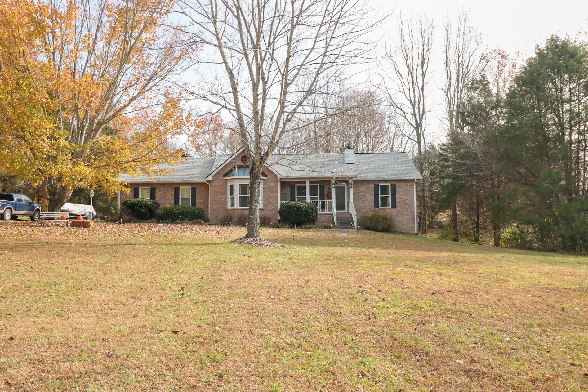 2279 South Williams Road Greenbrier, TN 37073 - Photo 2 of 28 a front view of a house with a yard and trees