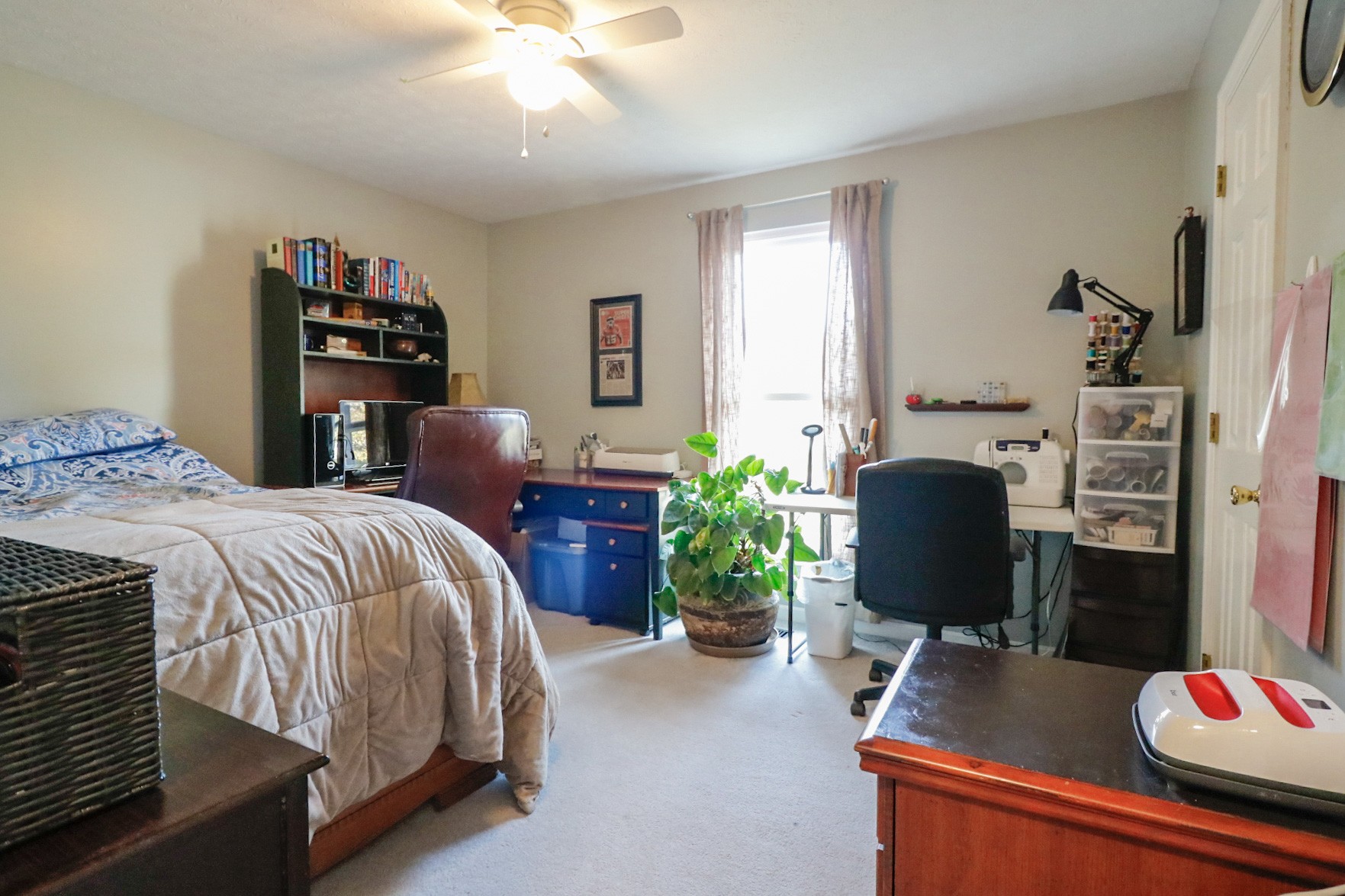 2279 South Williams Road Greenbrier, TN 37073 - Photo 19 of 28 a bedroom with bed and a potted plant