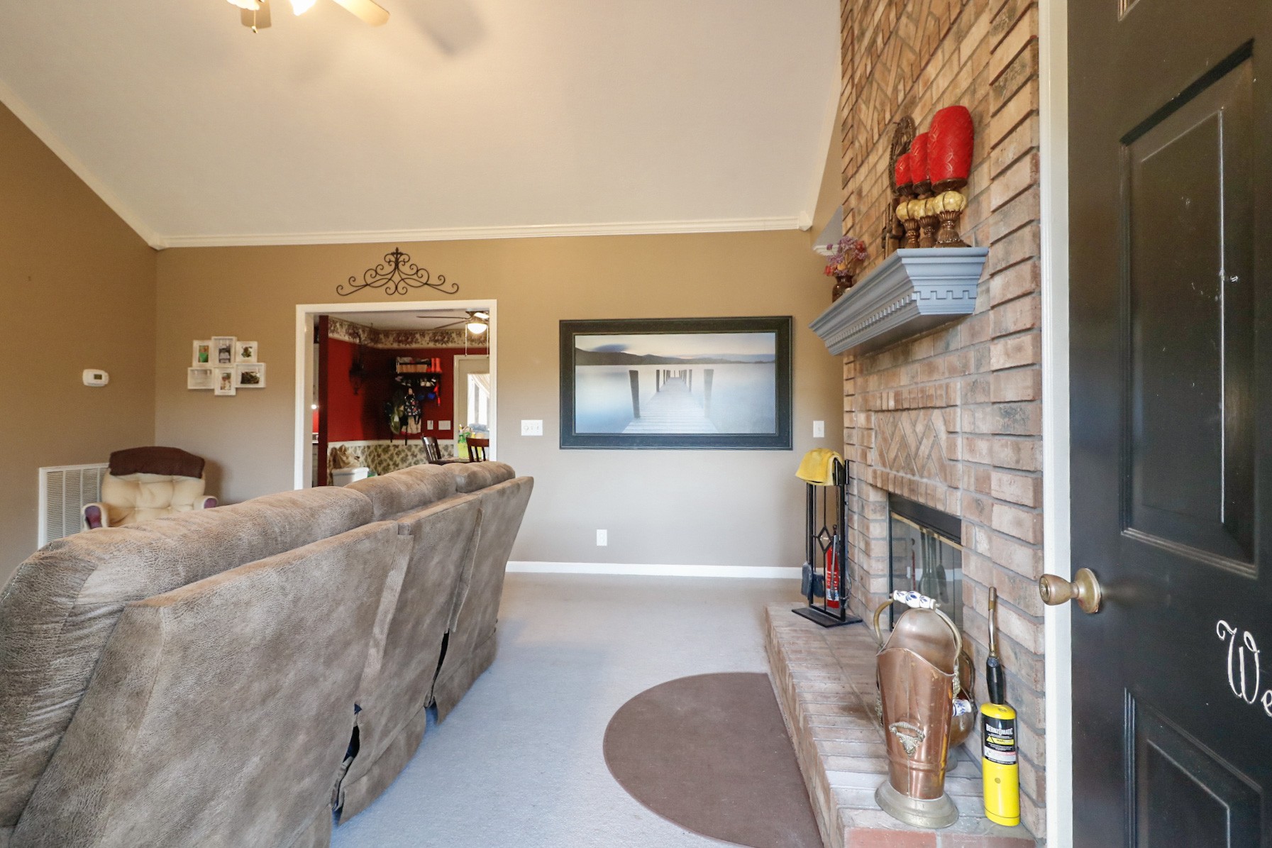 2279 South Williams Road Greenbrier, TN 37073 - Photo 6 of 28 a living room with furniture and a fireplace