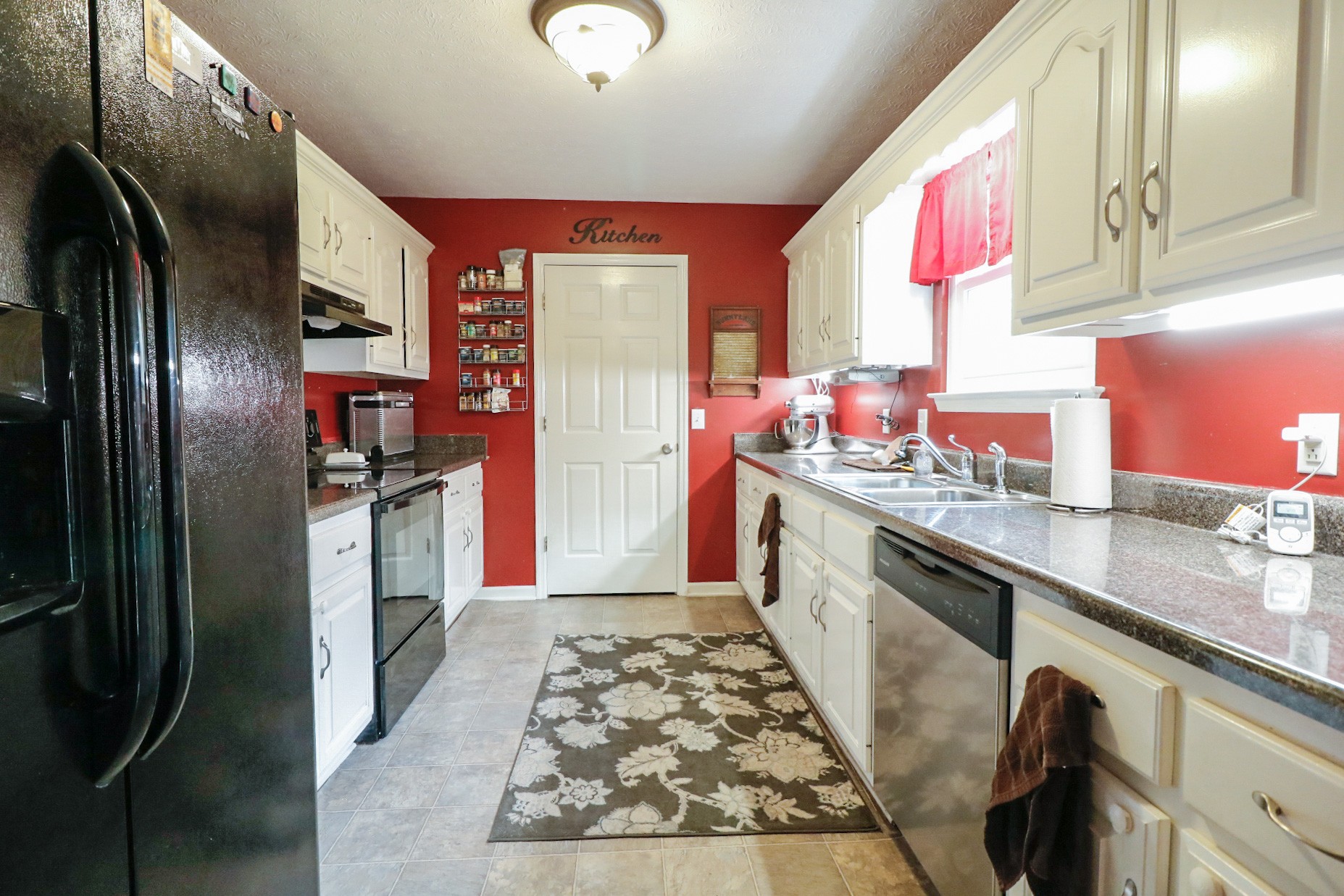 2279 South Williams Road Greenbrier, TN 37073 - Photo 9 of 28 a kitchen with stainless steel appliances granite countertop a refrigerator and a sink