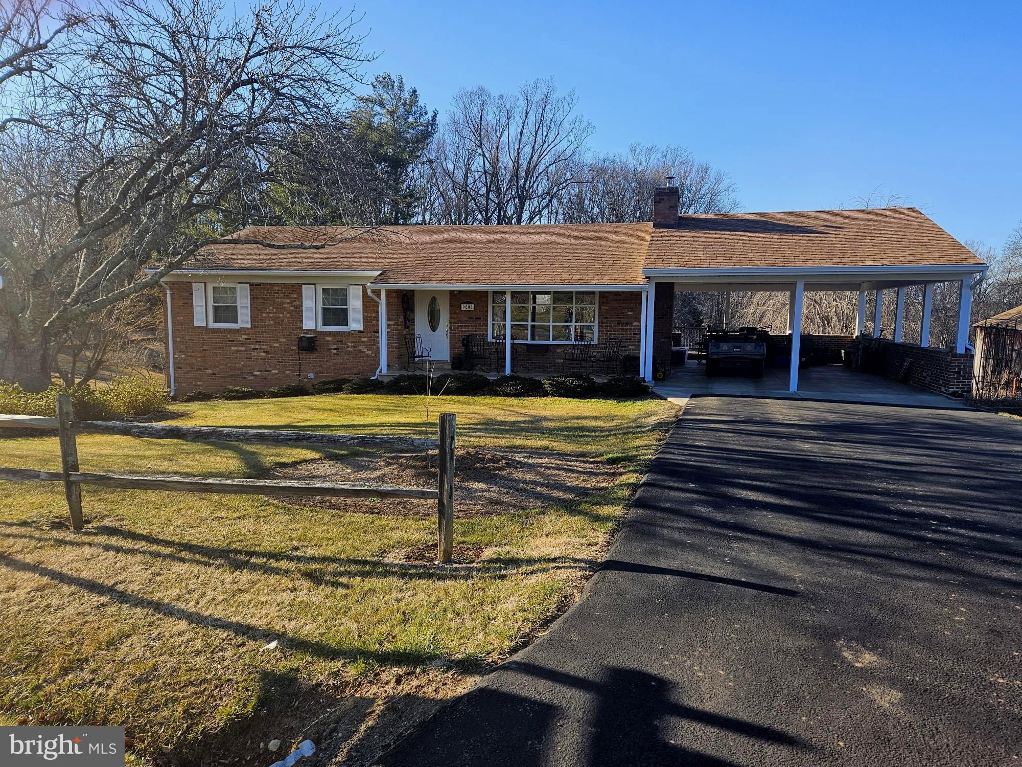 9808 Evans Ford Road Manassas, VA 20111 - Photo 3 of 3 a view of a house with swimming pool and a yard