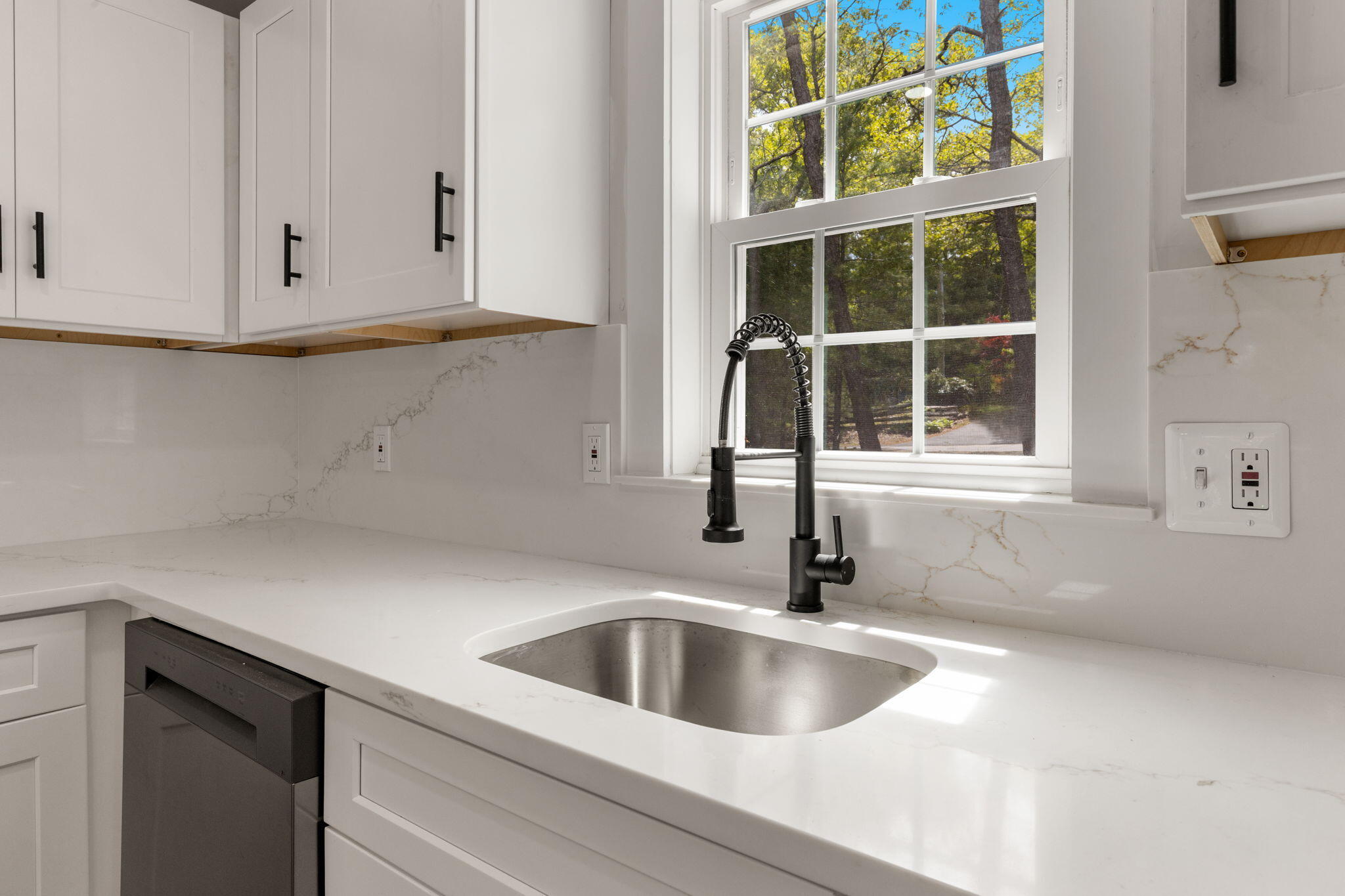 81 Sam Turner Road East Falmouth, MA 02536 - Photo 19 of 37 a kitchen with a sink and cabinets
