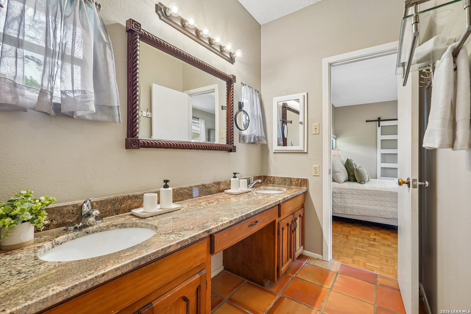20632 Timber Rose Drive Garden Ridge, TX 78266 - Photo 38 of 46 a en suite bathroom with a granite countertop double vanity