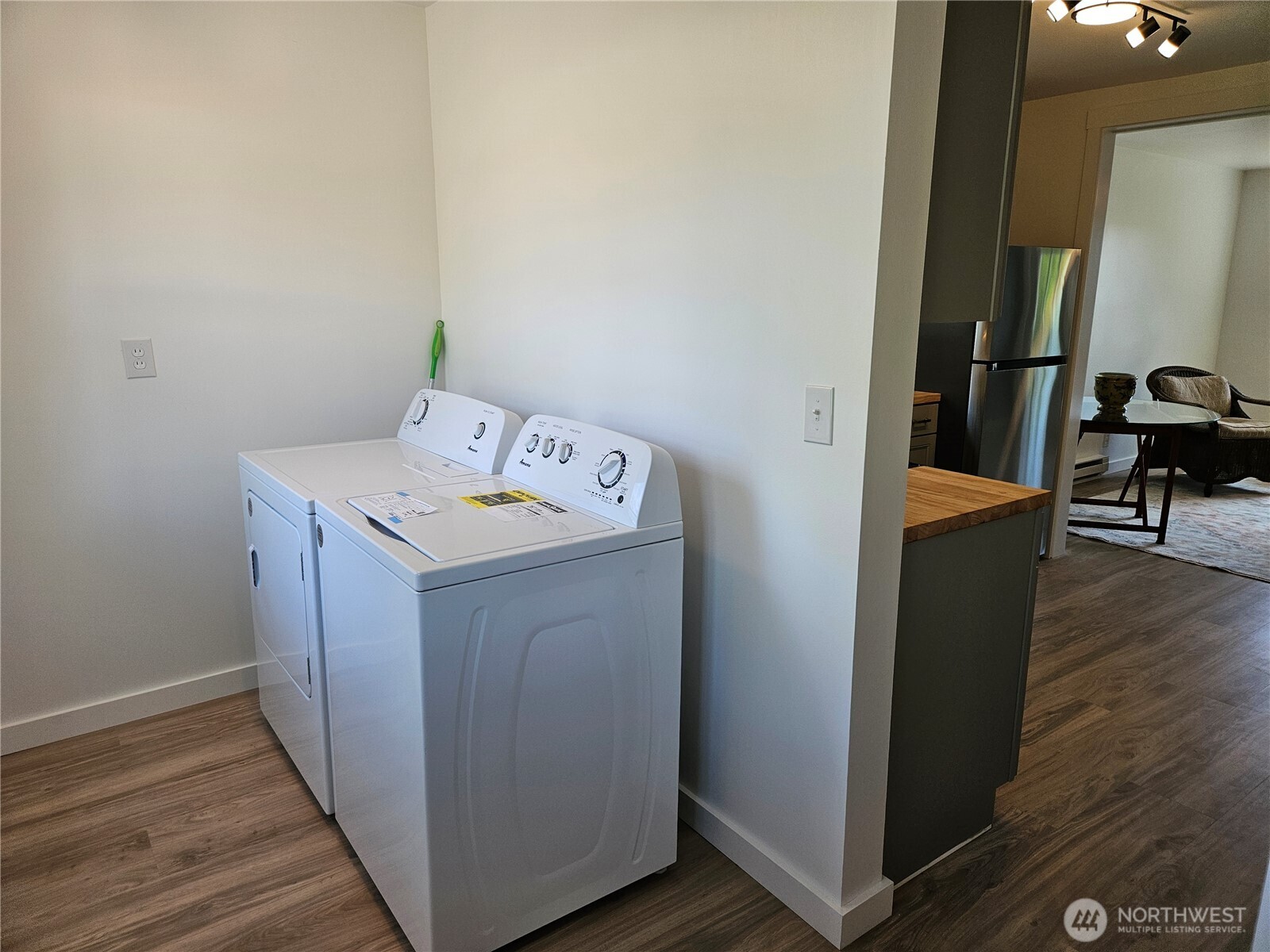 108 West 3rd Street Lind, WA 99341 - Photo 26 of 29 a utility room with wooden floor washer and dryer