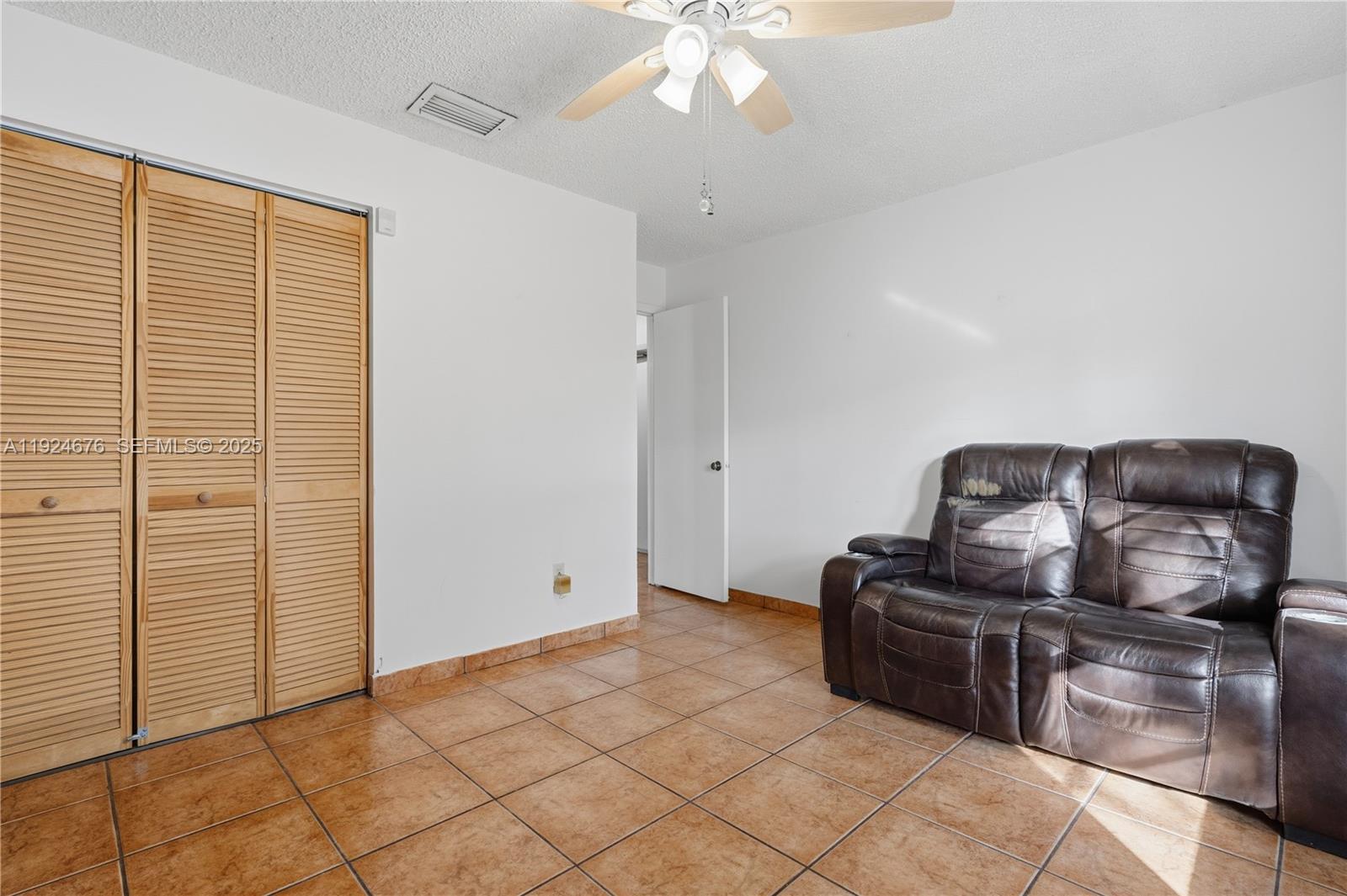 13585 Southwest 114th Terrace Miami, FL 33186 - Photo 25 of 42 a living room with furniture