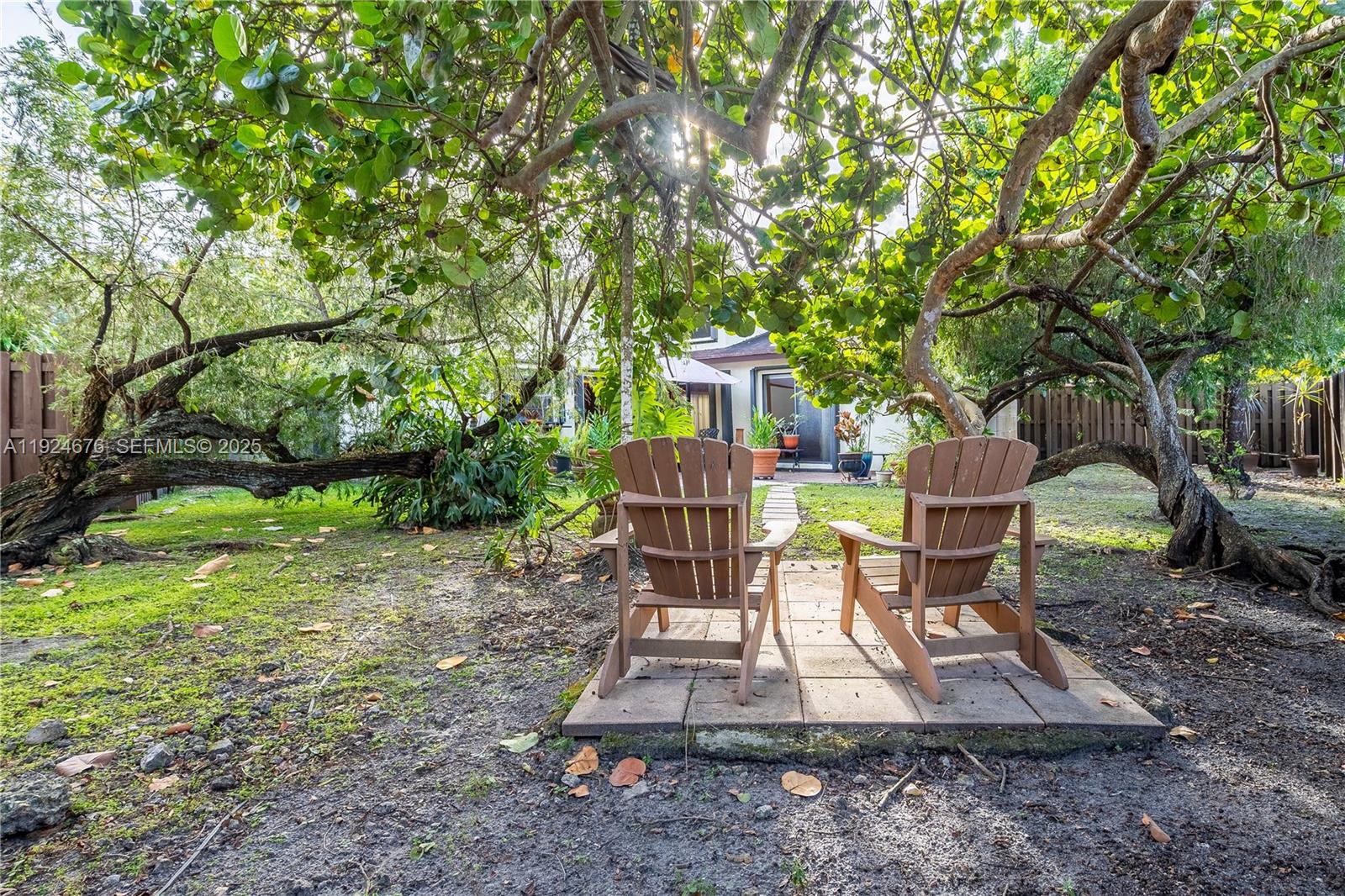 13585 Southwest 114th Terrace Miami, FL 33186 - Photo 36 of 42 a view of a backyard with sitting area