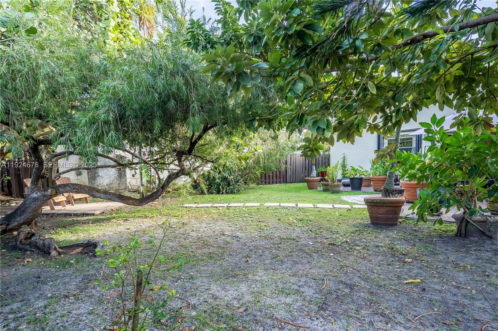 13585 Southwest 114th Terrace Miami, FL 33186 - Photo 39 of 42 a view of a backyard with tree s