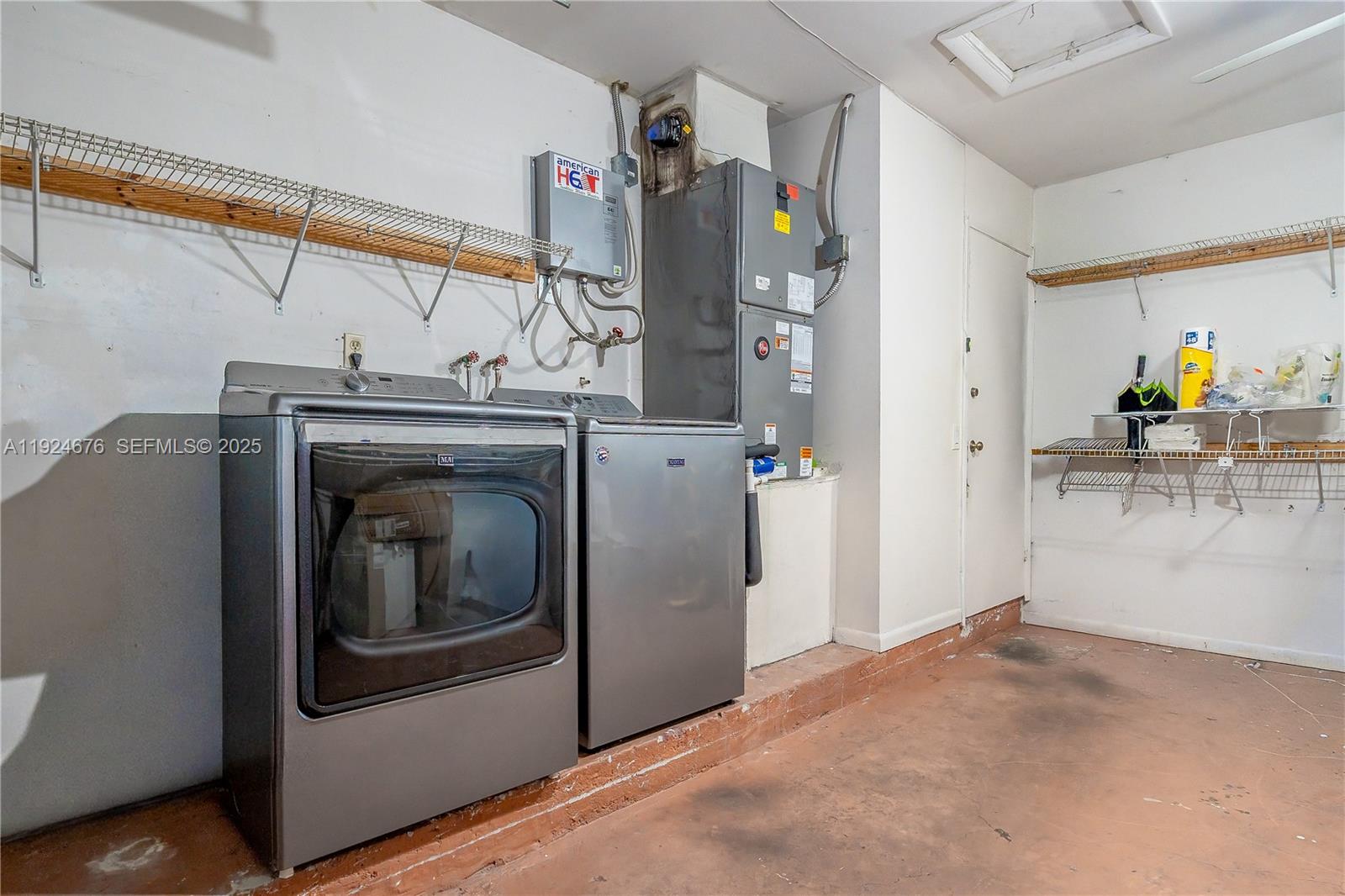 13585 Southwest 114th Terrace Miami, FL 33186 - Photo 40 of 42 a utility room with dryer and washer