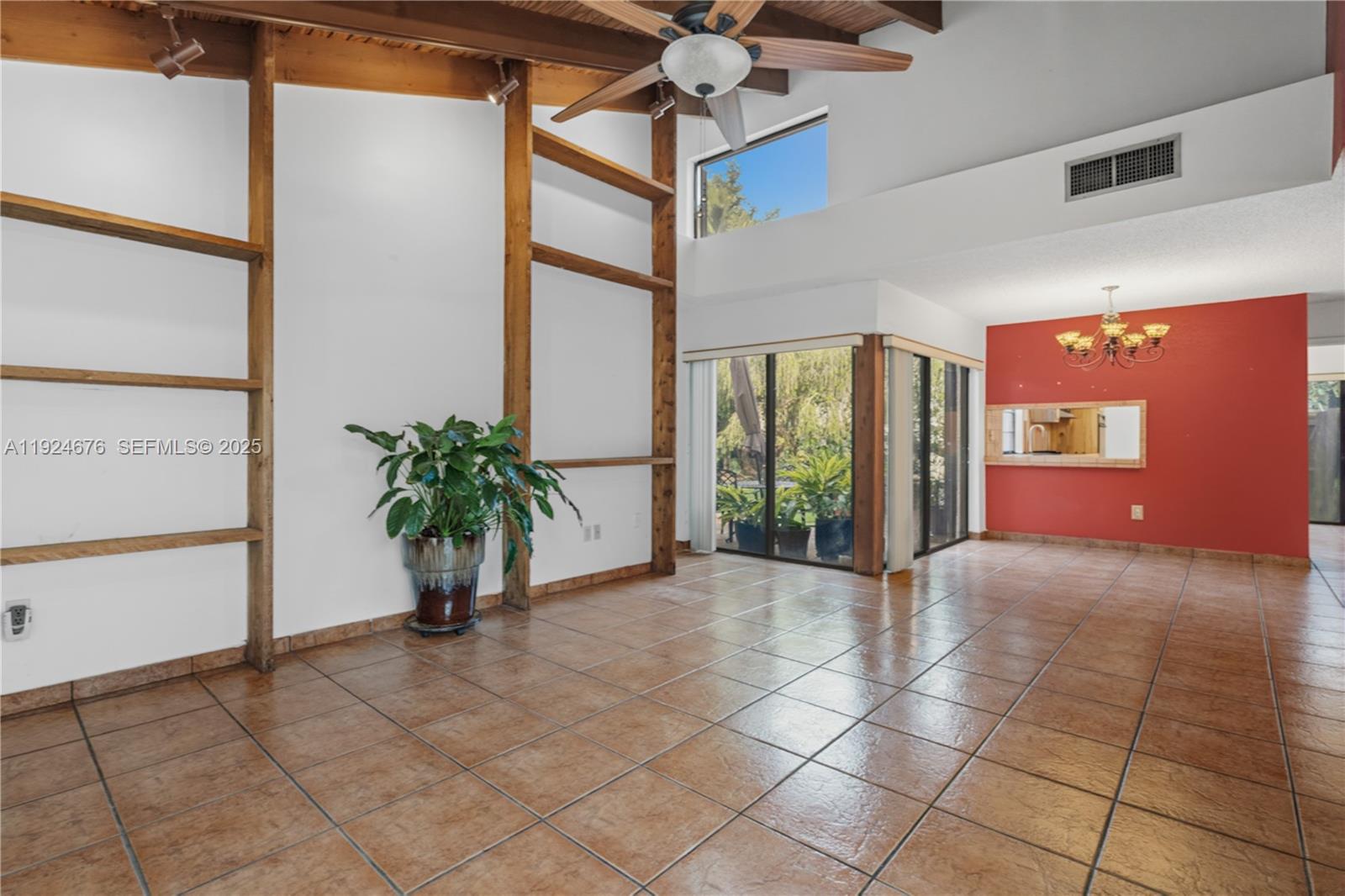 13585 Southwest 114th Terrace Miami, FL 33186 - Photo 7 of 42 a view of entryway with a potted plant