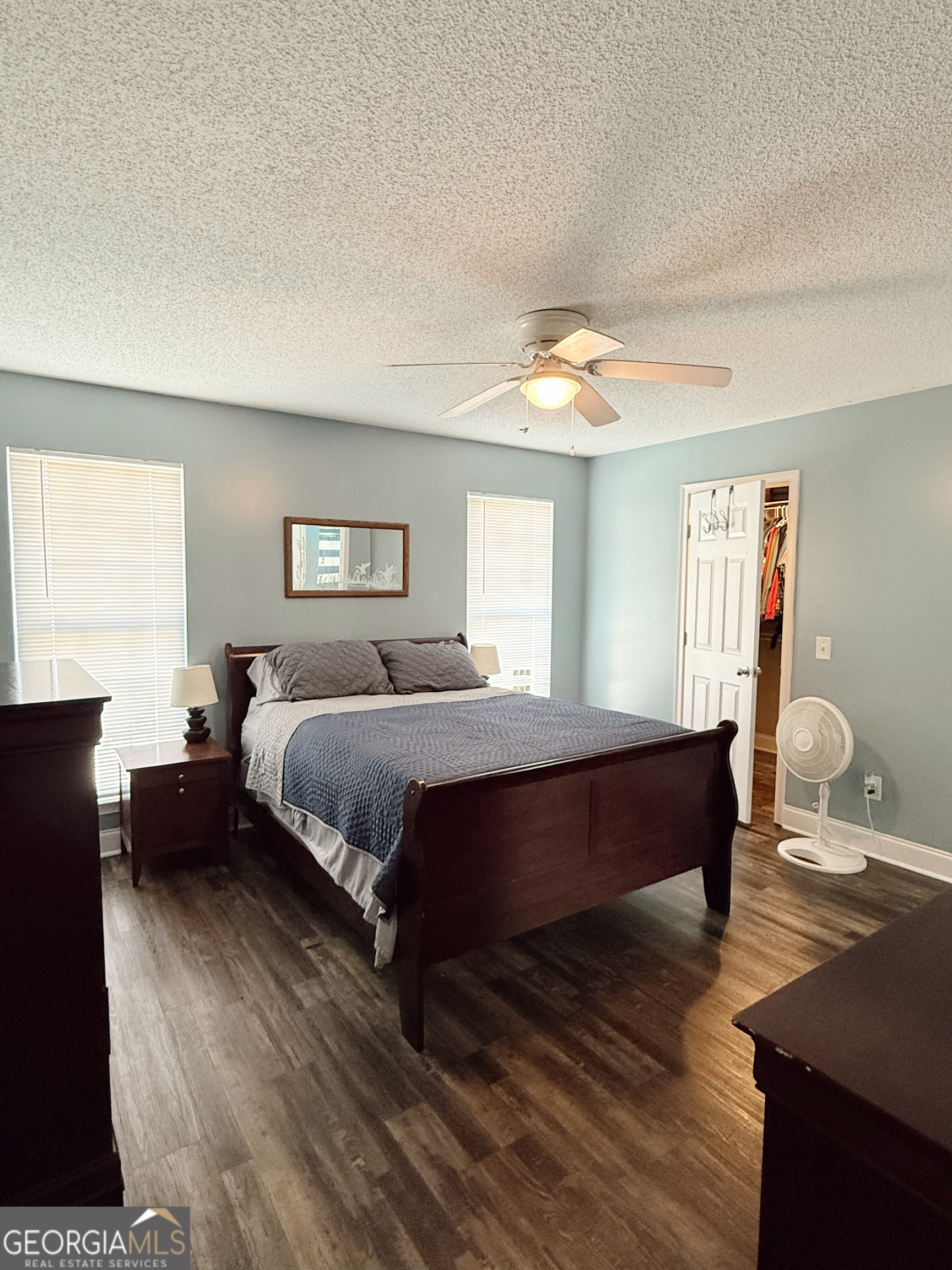 44 Quail Knoll Lane Cleveland, GA 30528 - Photo 15 of 42 a bedroom with a bed and wooden floor