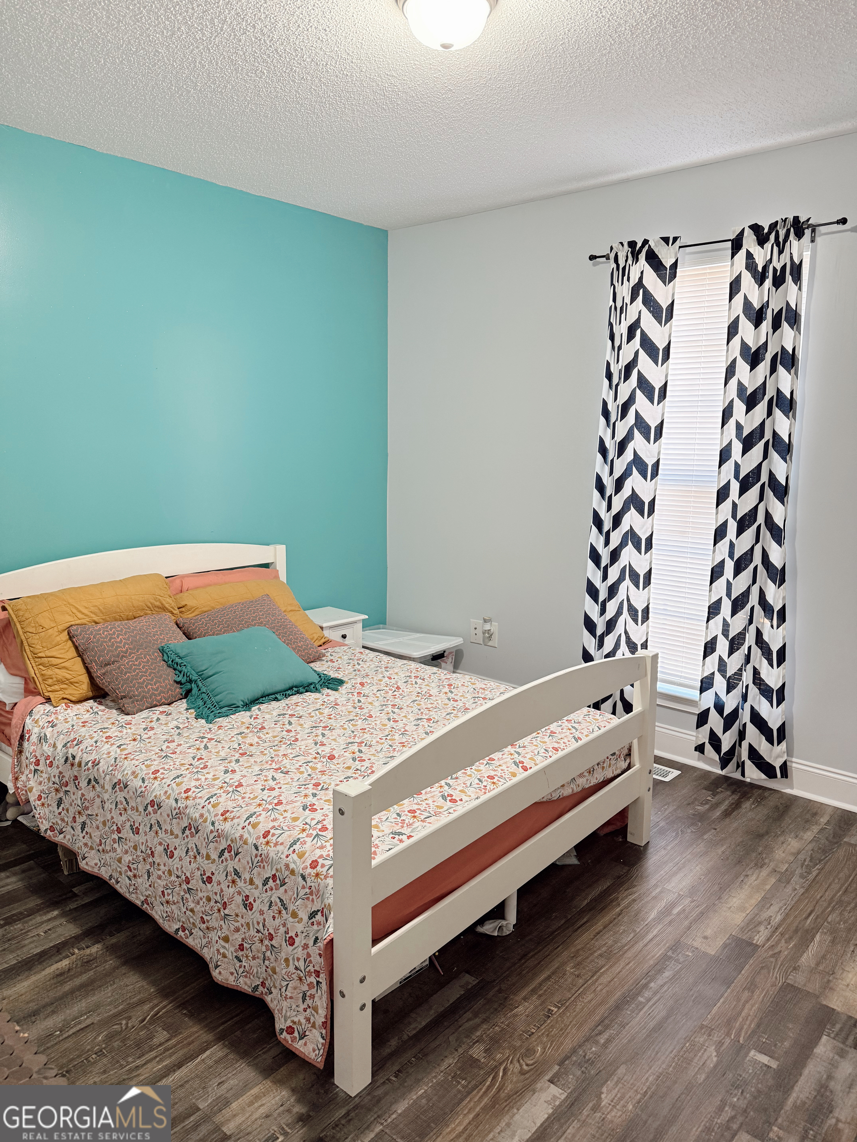 44 Quail Knoll Lane Cleveland, GA 30528 - Photo 19 of 42 a bedroom with a bed and window