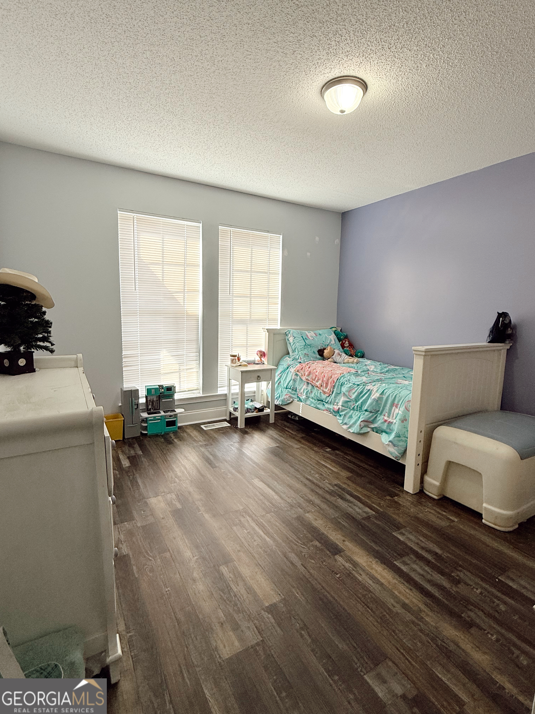 44 Quail Knoll Lane Cleveland, GA 30528 - Photo 23 of 42 a bedroom with bed and window