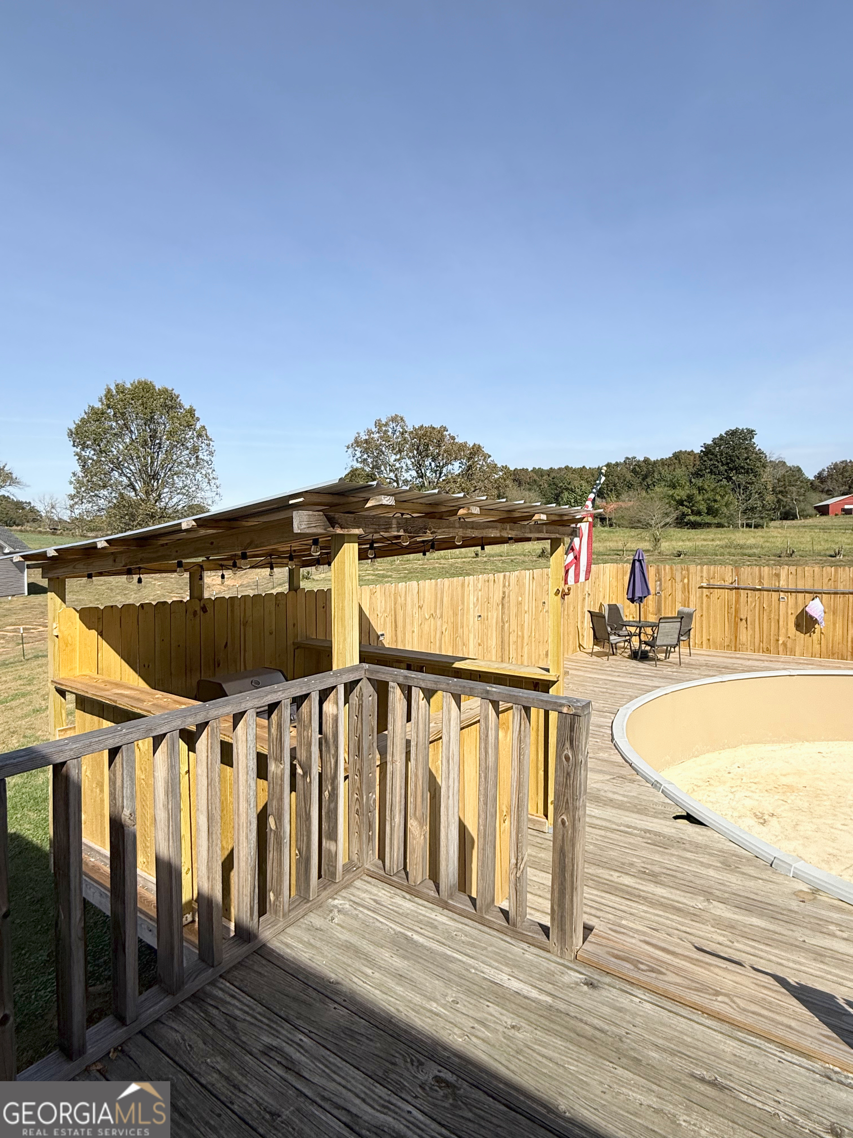44 Quail Knoll Lane Cleveland, GA 30528 - Photo 26 of 42 a view of a balcony with wooden floor and outdoor space