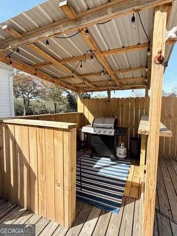 a view of a balcony with wooden floor