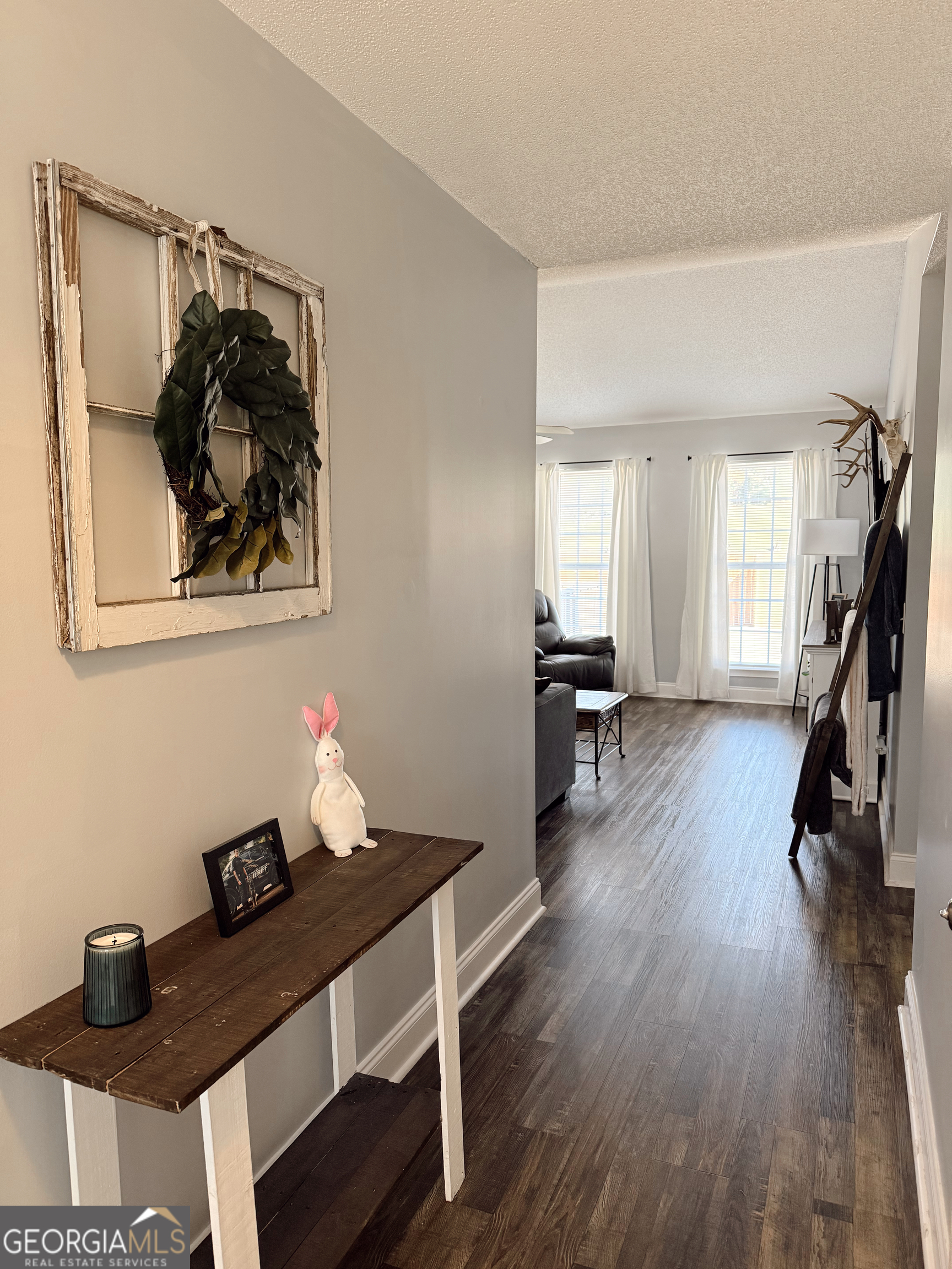 44 Quail Knoll Lane Cleveland, GA 30528 - Photo 3 of 42 a view of a workspace with furniture and wooden floor