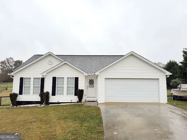 a view of a terrace with sitting area
