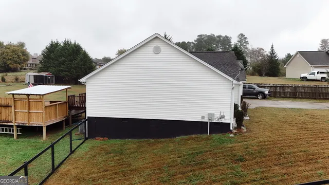 a view of a lake with a house
