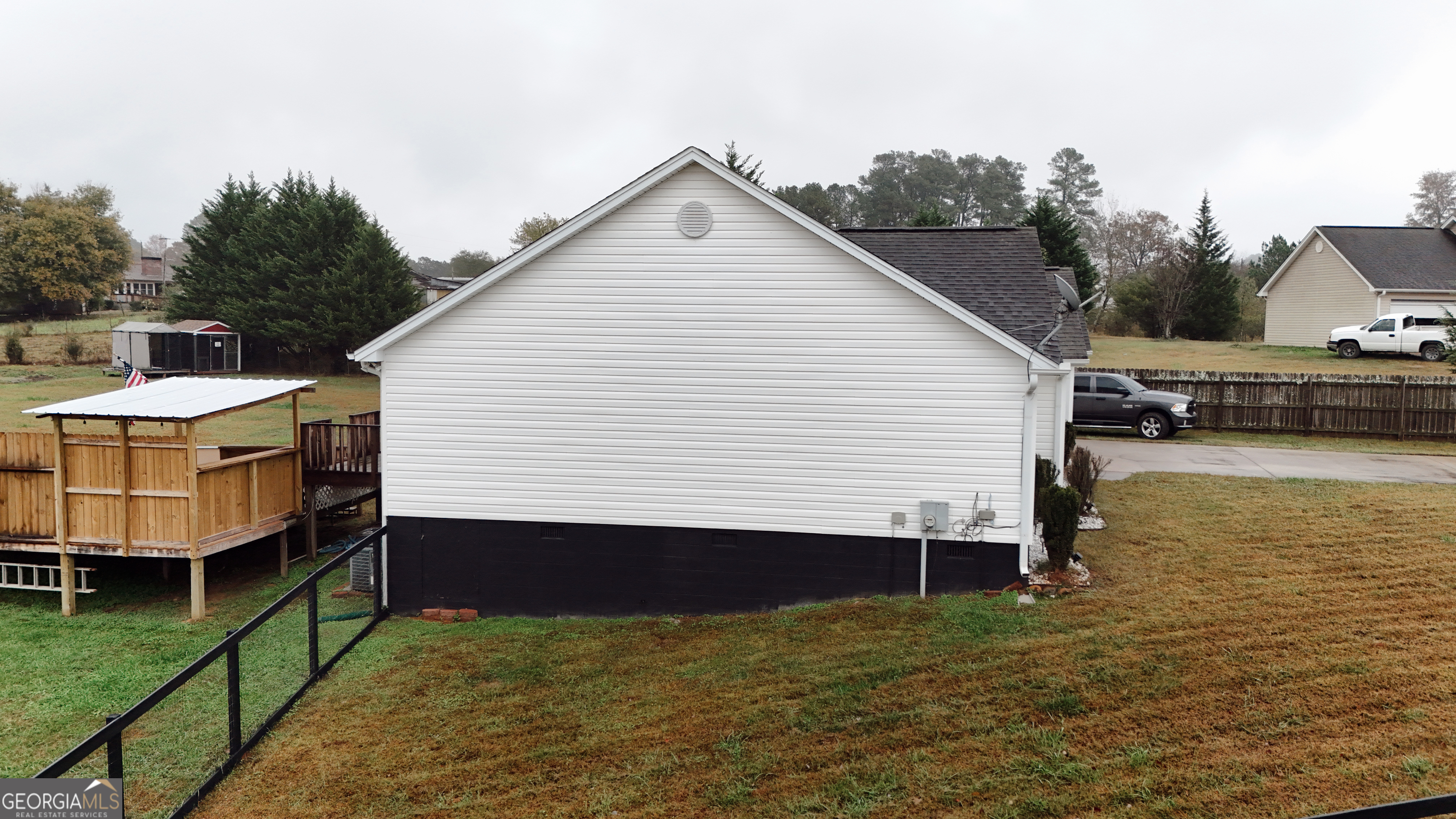 44 Quail Knoll Lane Cleveland, GA 30528 - Photo 35 of 42 a view of a house with a yard and sitting area