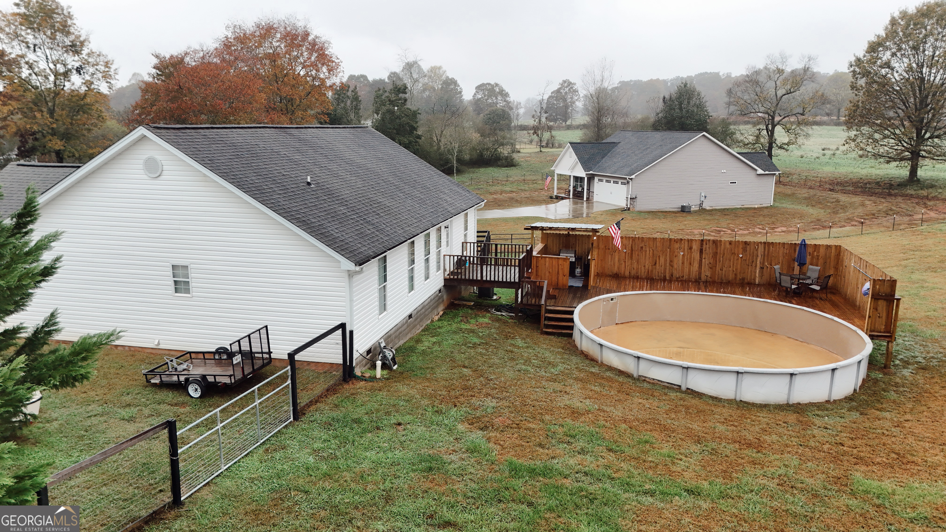 44 Quail Knoll Lane Cleveland, GA 30528 - Photo 40 of 42 a view of a house with backyard and sitting area